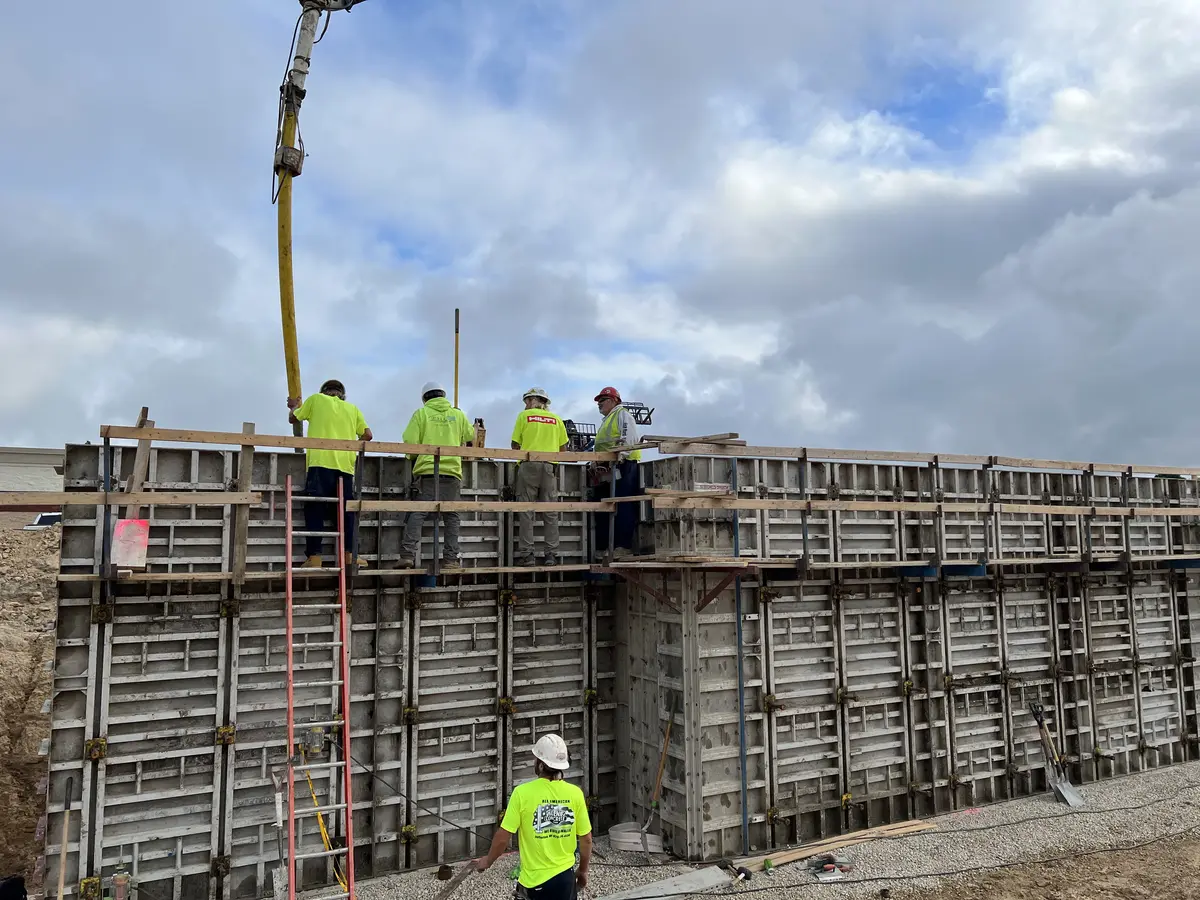 Careers_Join-Our-Team Team members pouring concrete foundation
